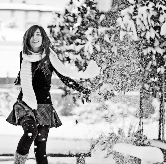 Having fun in the snow, young woman poses with snow in a city park, Europe,  Stock Photo, Picture And Royalty Free Image. Pic. MUI-03586443 |  agefotostock